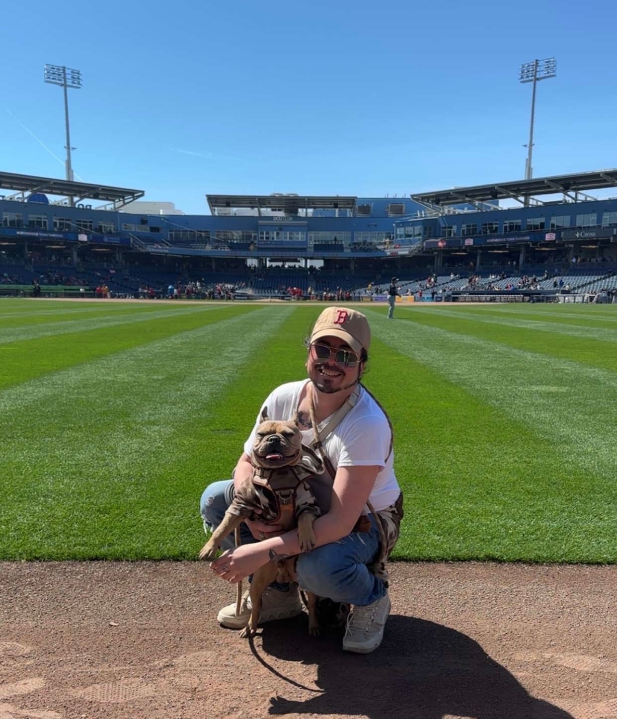 Gregory McCauley with his dog at WOOF at the Park, Polar Park